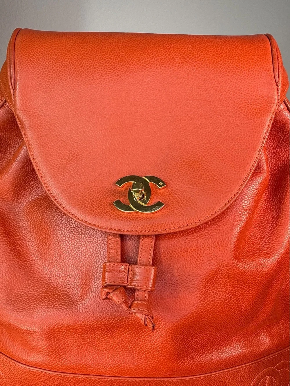 CHANEL Orange Caviar Leather Backpack with CC Trim and Gold Hardware